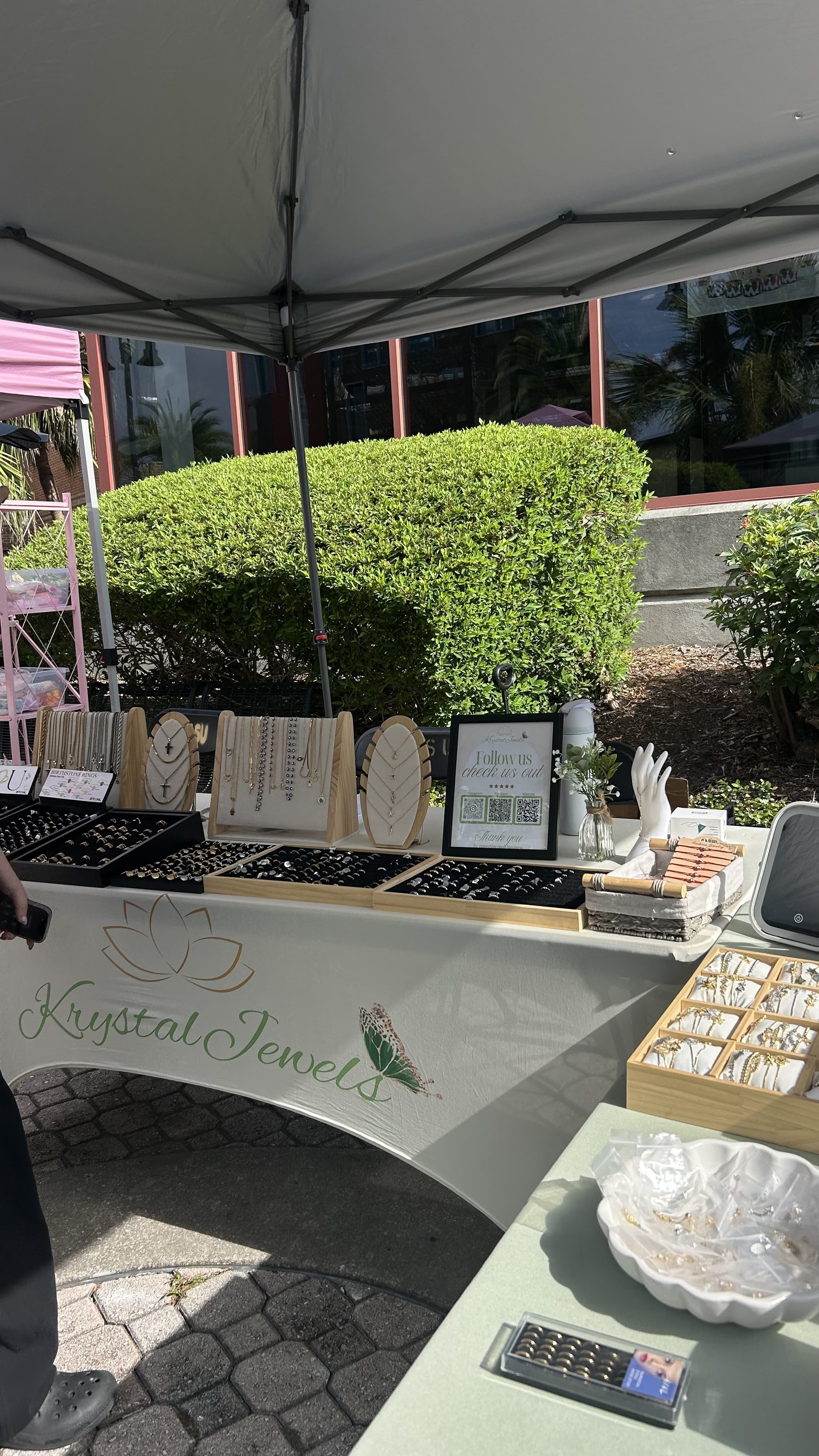 The Krystal Jewels stall set up under a canopy at a local market