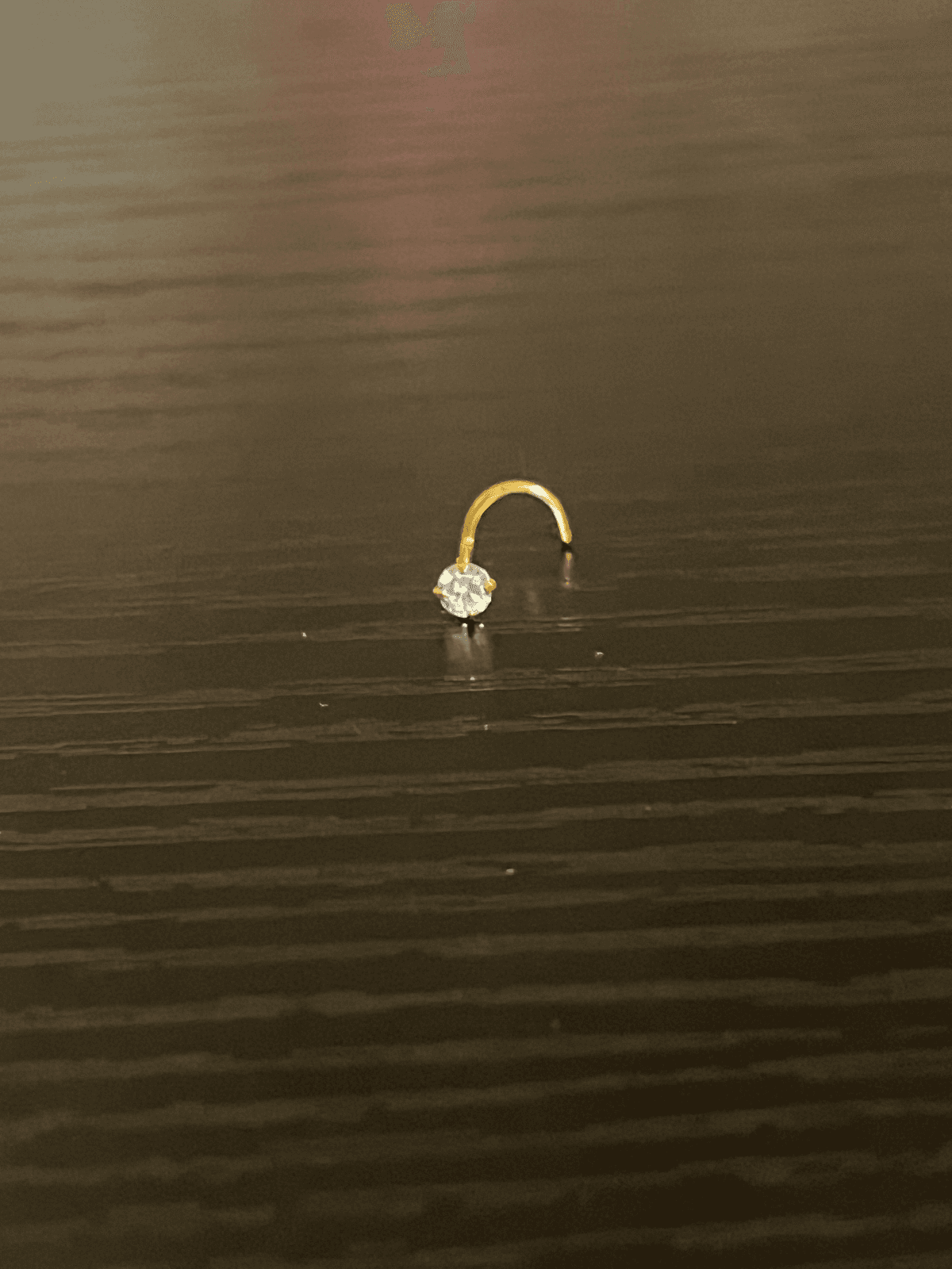 Diamond nose twist piercing